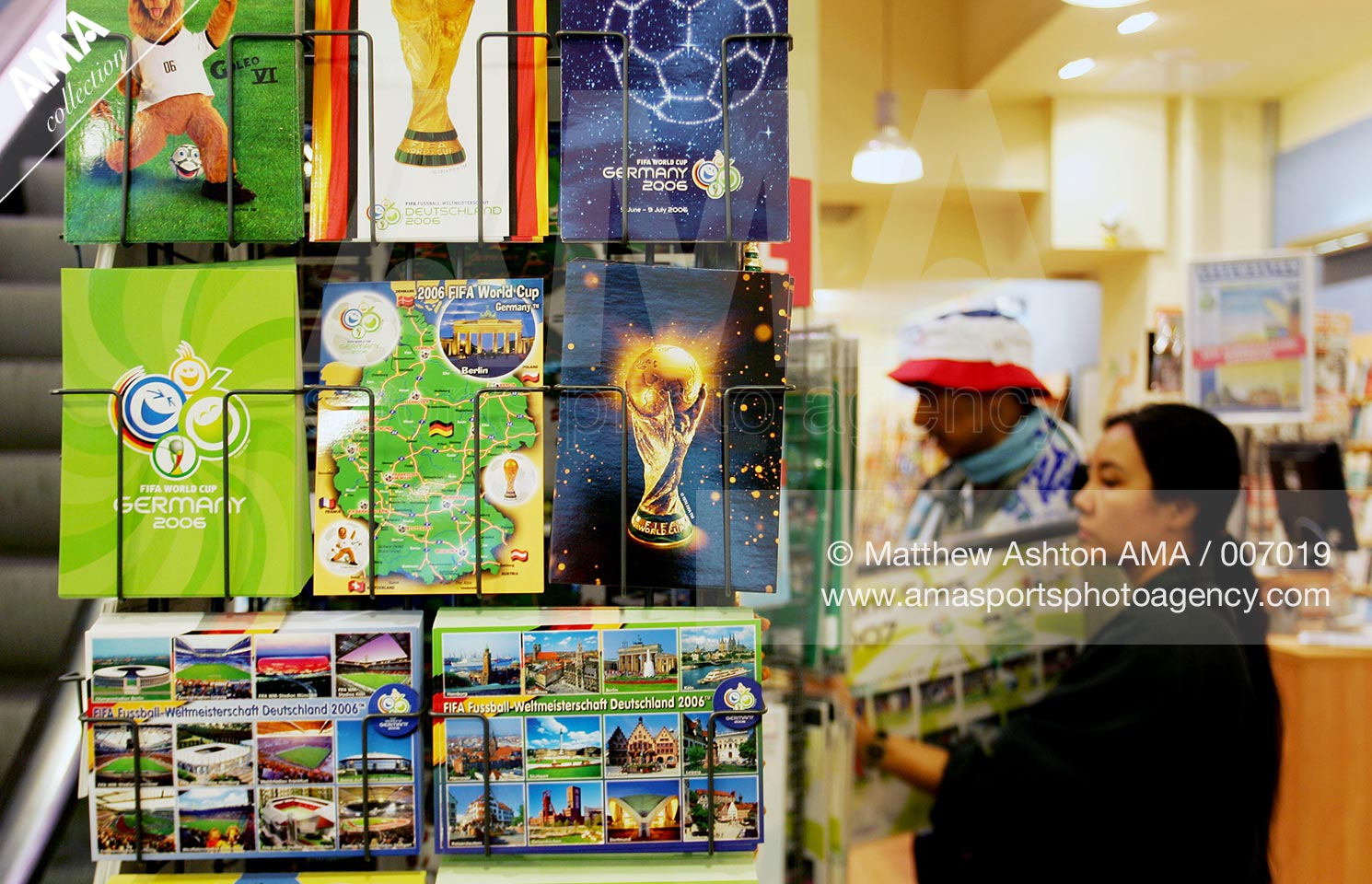 17 June 2006 - FIFA World Cup 2006 - Group E - Czech Republic v Ghana - Fans purchase World Cup postcards in shop in Koln