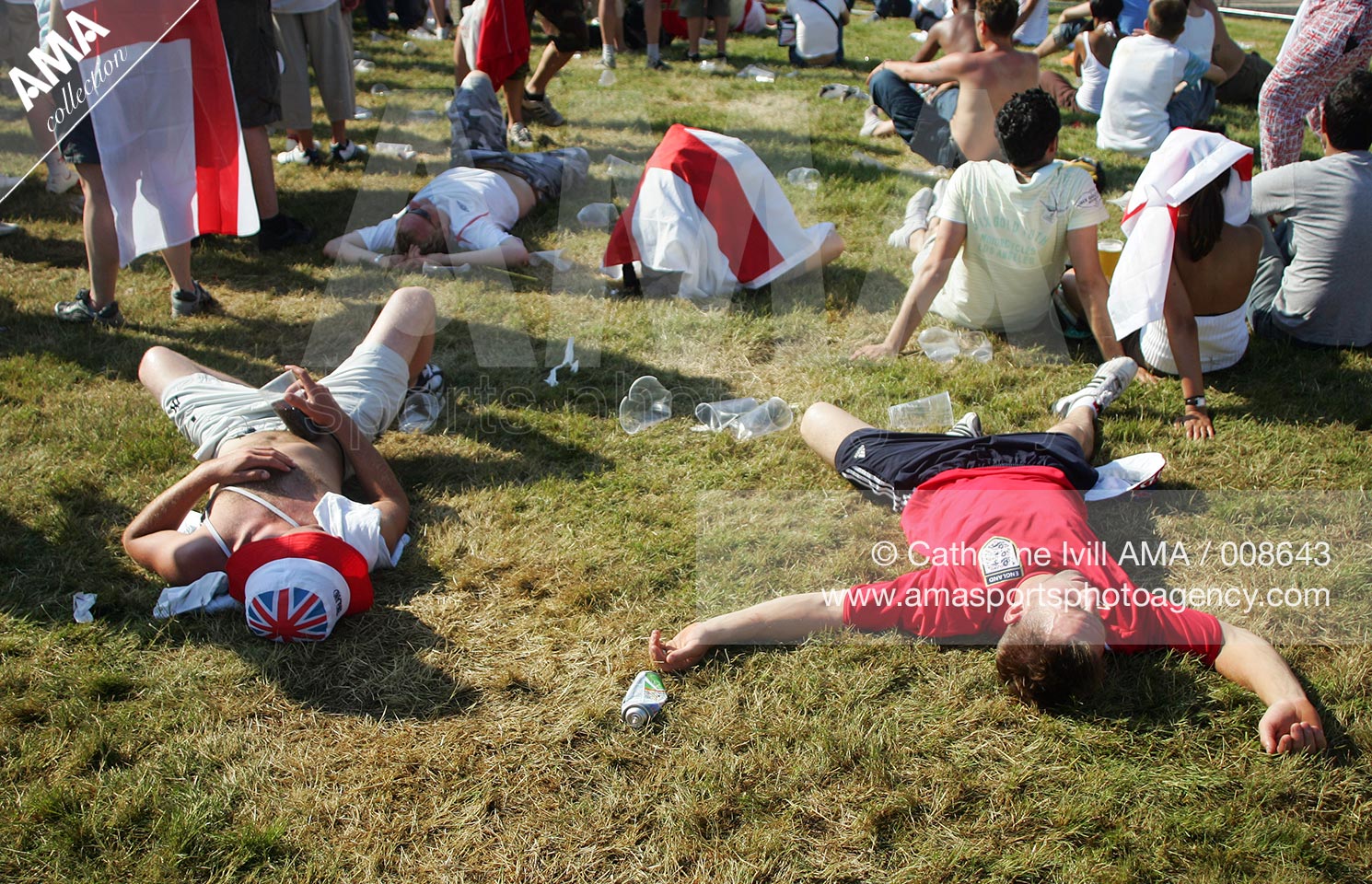 02 July 2006 - FIFA World Cup 2006 - Quarter Final - England v Portugal - England fans pass out after drinking in the heat at the Fan Fest in Gelsenkirchen