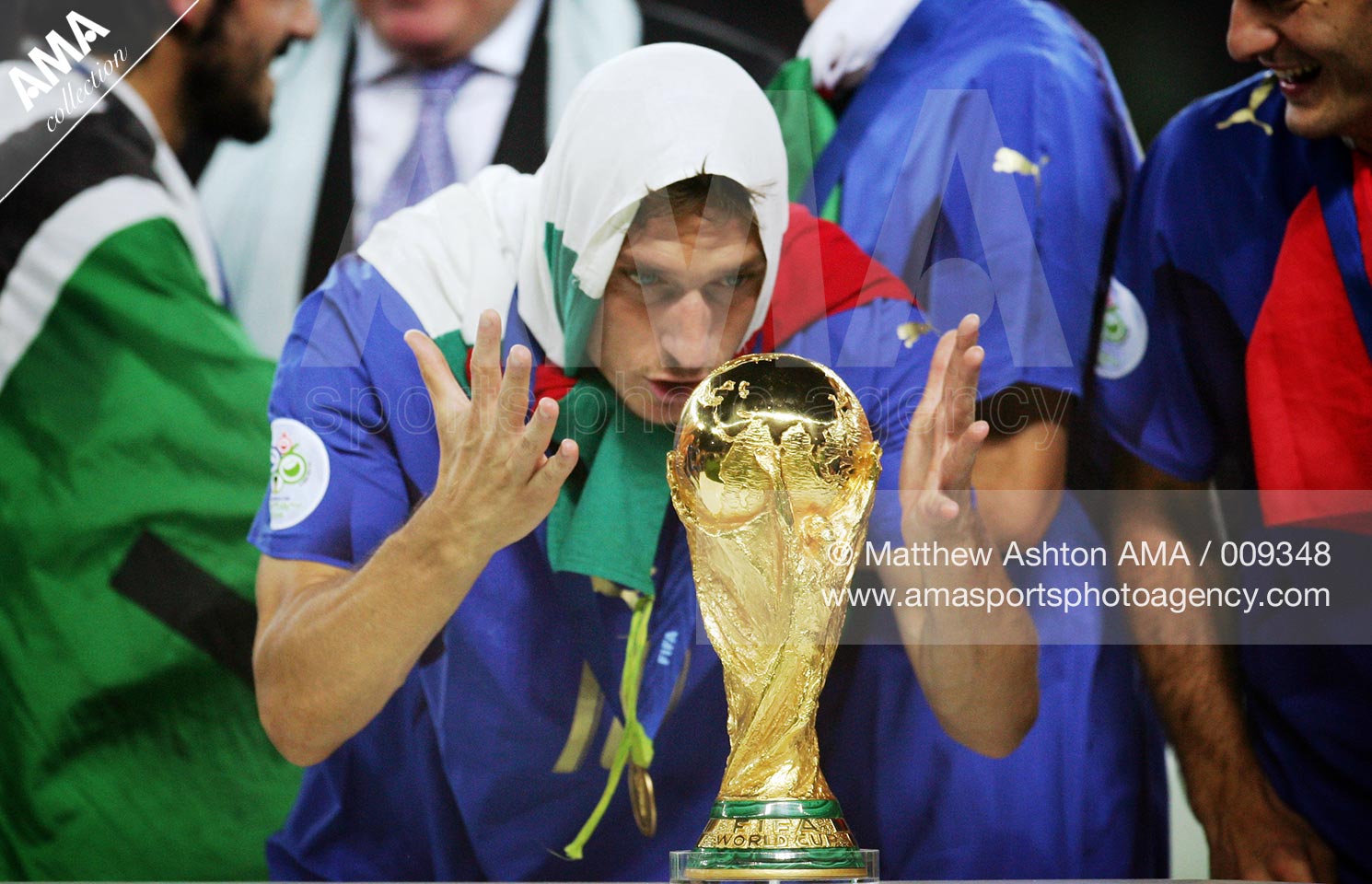 09 July 2006 - FIFA World Cup 2006 - Final - Italy v France - Francesco Totti of Italy looks at the FIFA World Cup Trophy